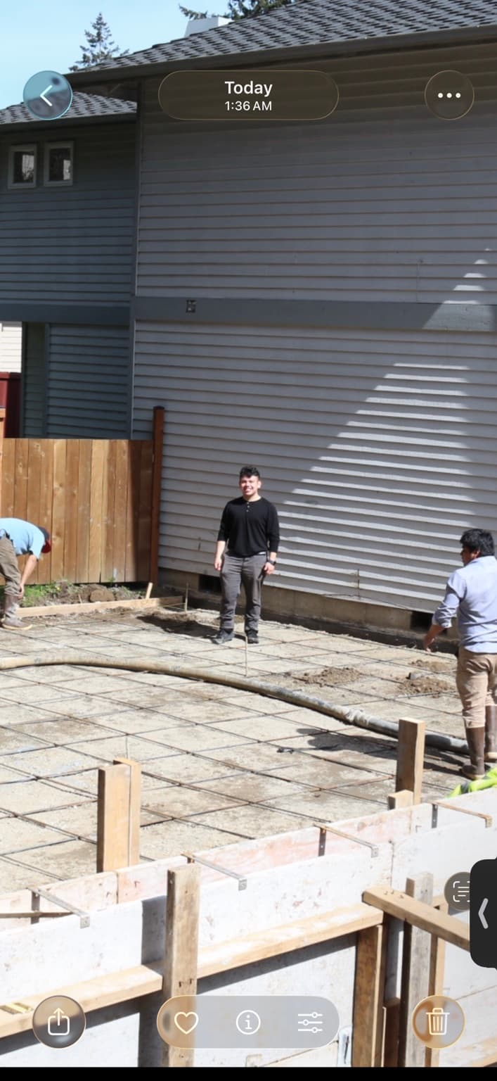 David, owner of Ultra Quality Construction, on site during concrete preparation